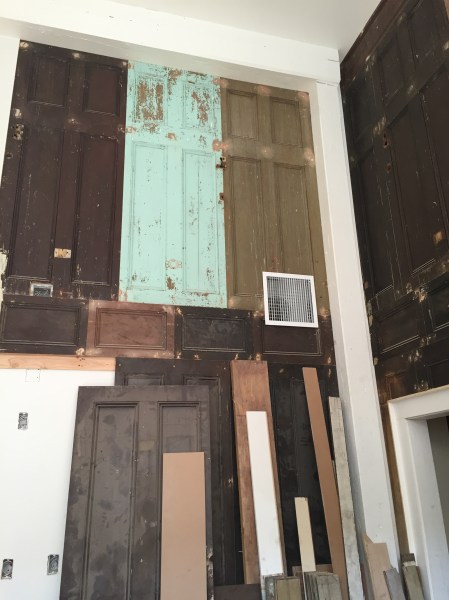 A lot of the wood used in the hotel has been salvaged from other parts of the building, including the old doors that line the walls of the lobby.